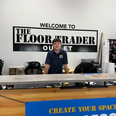 Welcome to The Floor Trader in Loves Park IL with front desk associate